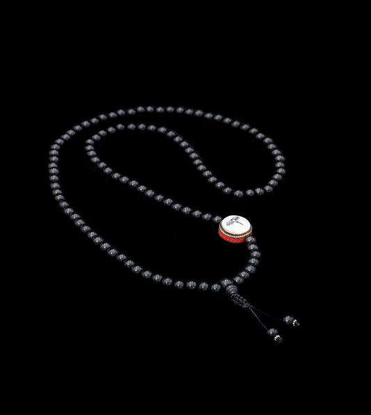 Ebony Wood Mala inlaid with Mother of Pearl stone featuring Buddha eyes – TM015