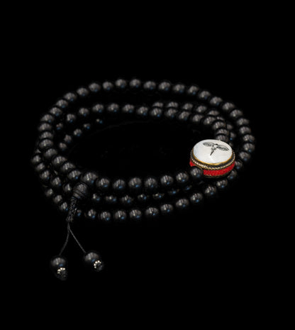 Ebony Wood Mala inlaid with Mother of Pearl stone featuring Buddha eyes – TM015